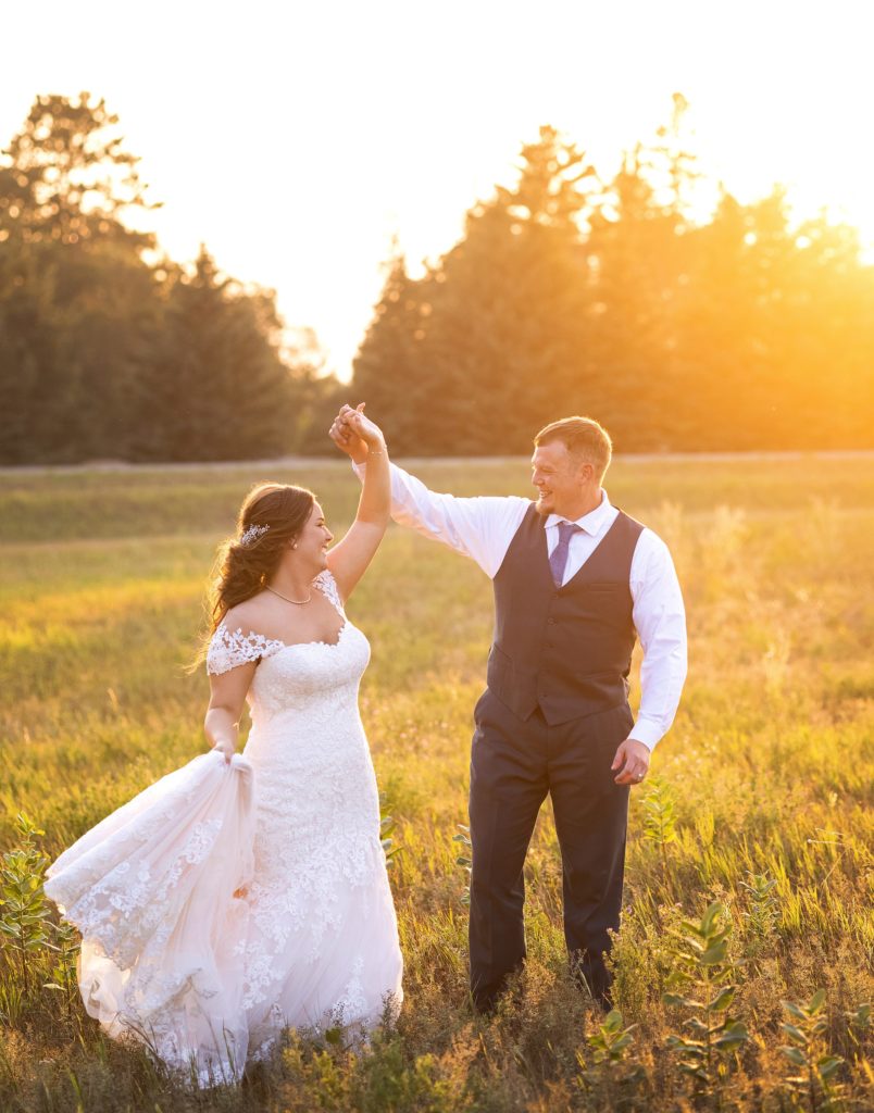 bride and groom at sunset on their wedding day