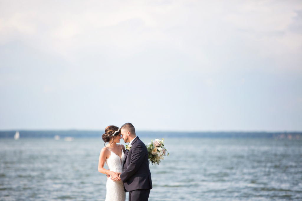 a bride and groom on a lake in Minnesota 