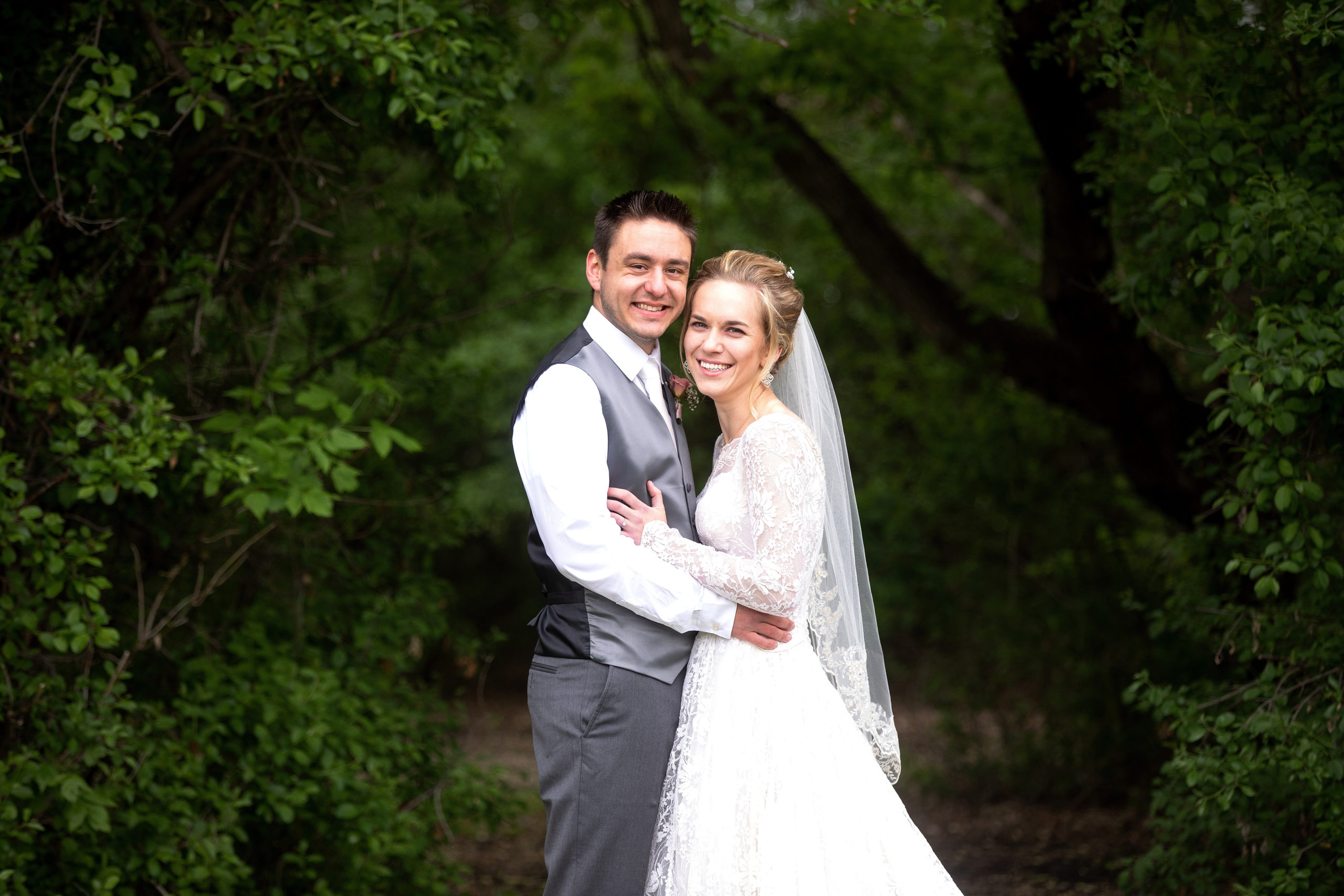 Smiling bride and groom at Legacy Acres Wedding venue